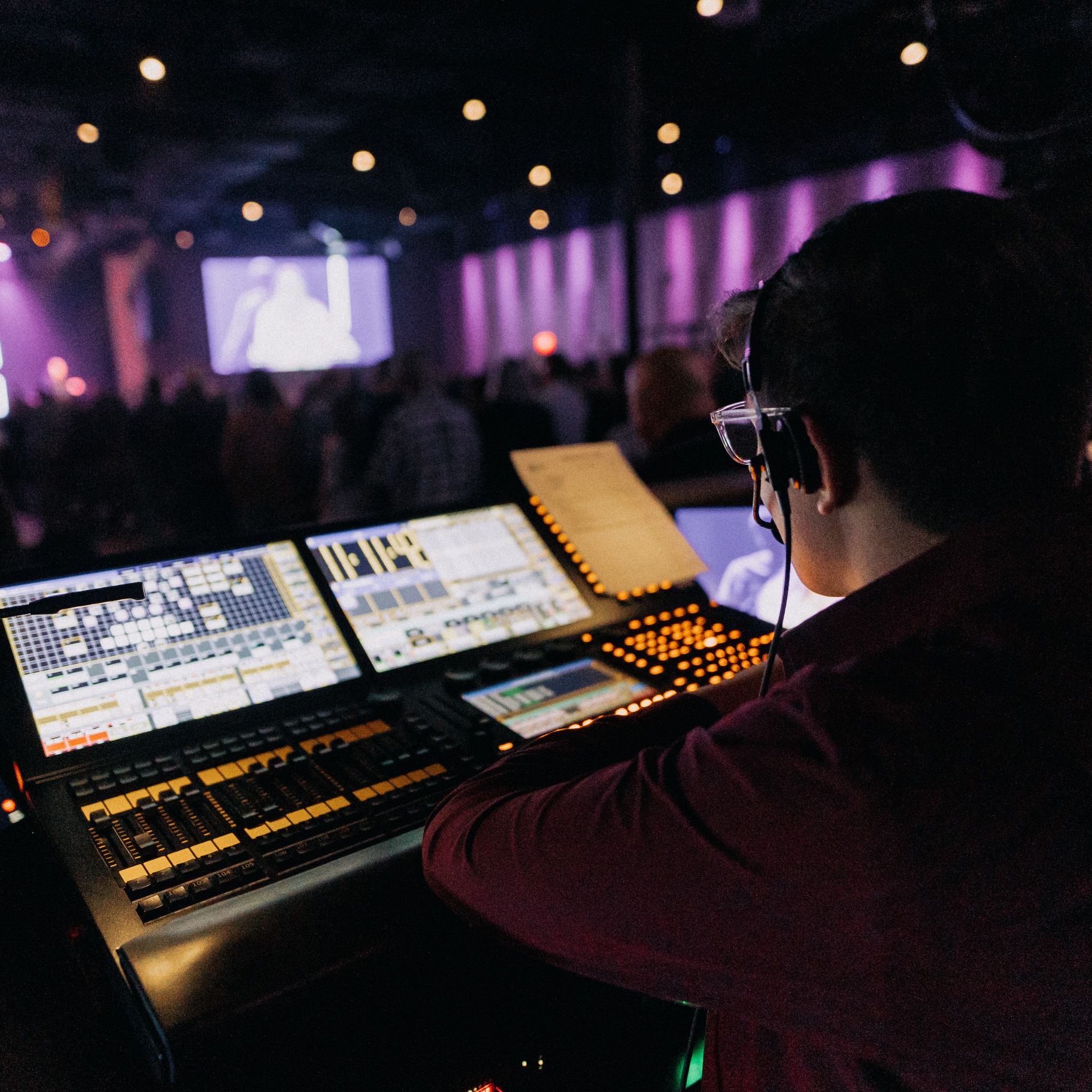 Man looking at an electric equalizer